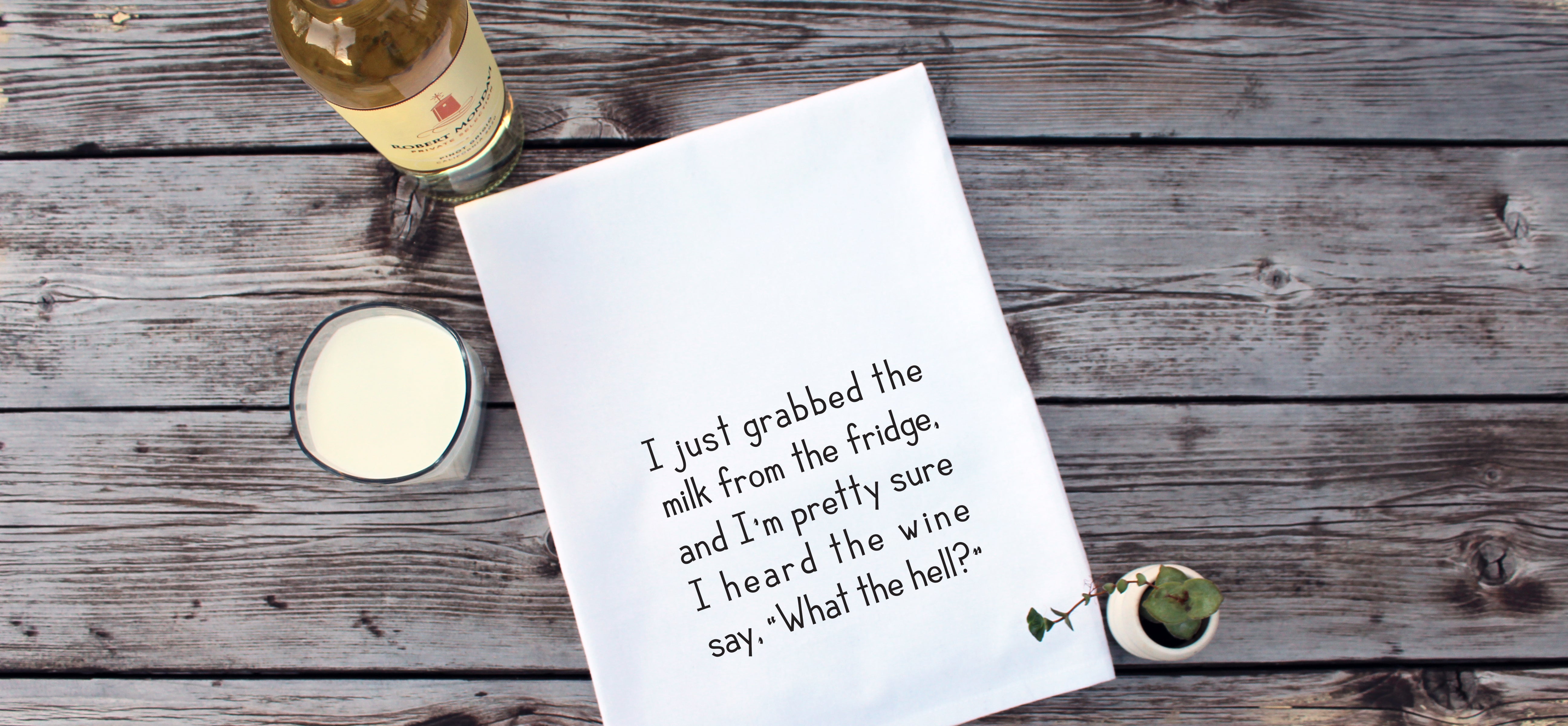 I just grabbed the milk from the fridge and I'm pretty sure I heard the wine say, "what the hell?" - white kitchen tea towel