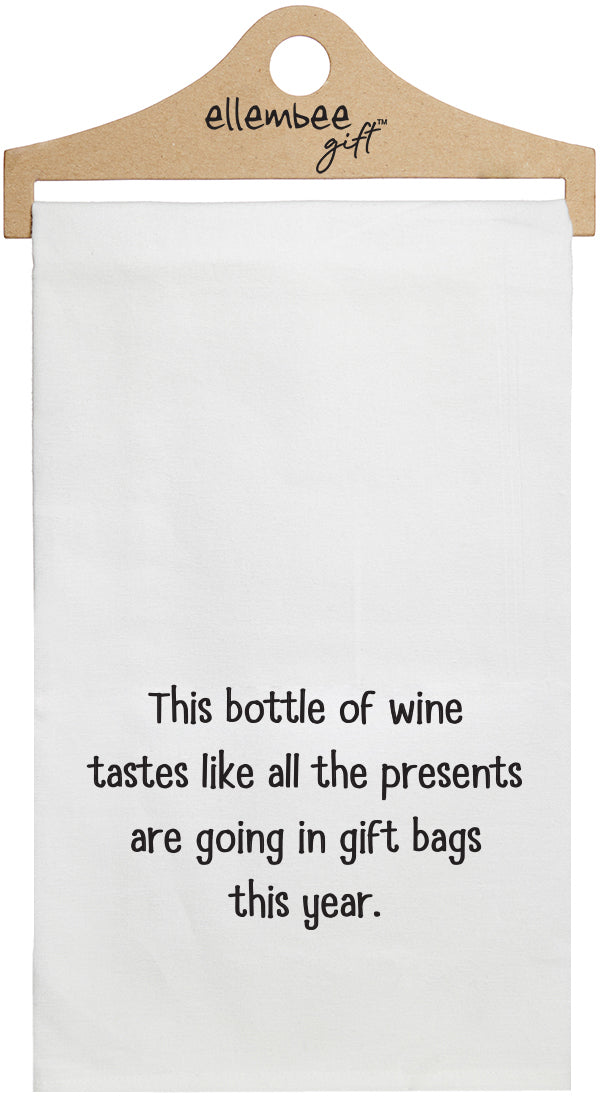 This bottle of wine tastes like all the presents are going in gift bags this year - white kitchen tea towel