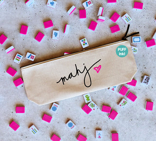 Canvas tile bag for mahjong with printed black ink text that reads 'Mahj' with a puffy pink heart design.