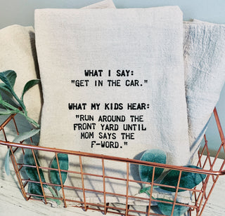 What I say, "Get in the car." What my kids hear, "Run around the front yard till mom says the F-word."