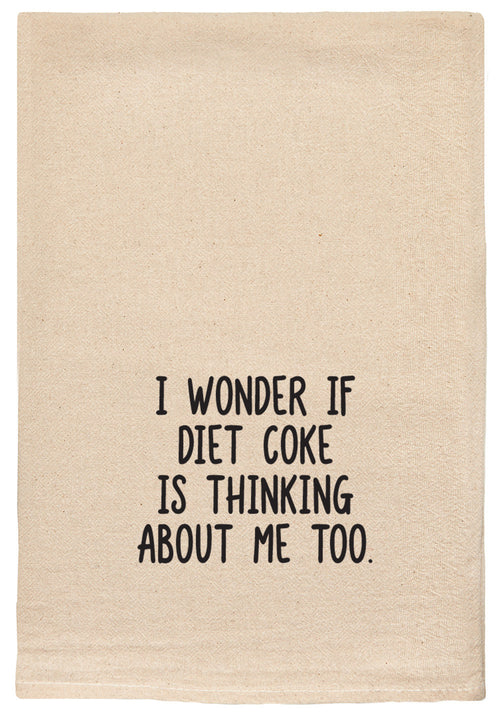 Kitchen towel with printed text 'I wonder if Diet Coke is thinking about me too.' printed in black ink on a beige towel.