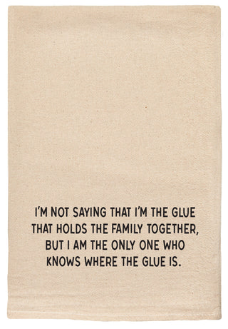 Natural kitchen towel with printed text 'I'm not saying that I'm the glue that holds the family together, but I am the only one who knows where the glue is.' printed in black ink.
