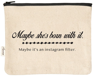 Canvas makeup bag printed with "maybe she's born with it, maybe it's an Instagram filter" in black text.