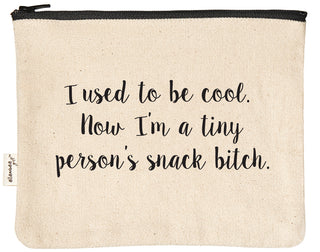 Canvas zipper pouch printed with "I used to be cool, now I'm a tiny person's snack bitch" in black text.