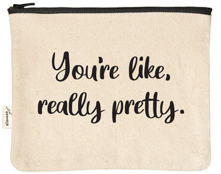 Canvas makeup bag printed with "you're like really pretty" in black text.