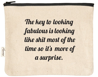 Natural canvas makeup bag with a black YKK zipper, printed in black with "The key to looking fabulous is looking like shit most of the time so it's more of a surprise."
