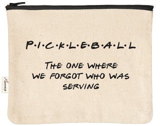 Natural canvas zipper pouch with a black YKK zipper, printed in black with "The one where we forgot who was serving" and "pickleball."