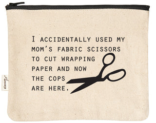 Natural canvas zipper pouch with a black YKK zipper, printed in black with "I accidentally used my mom's fabric scissors and now the cops are here."