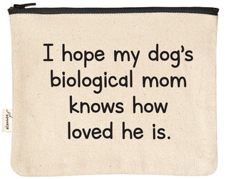 Natural canvas zipper pouch with a black YKK zipper, printed in black with "I hope my dog's biological mom knows how loved he is."