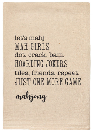Mahjong text printed in black ink on a beige background colored towel.