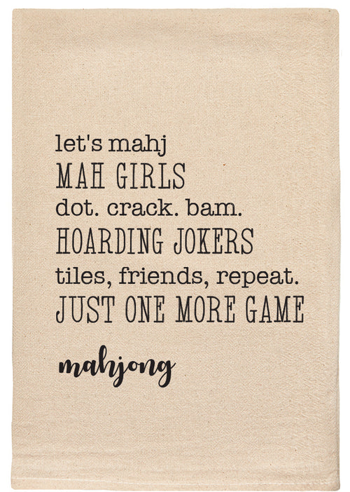 Mahjong text printed in black ink on a beige background colored towel.