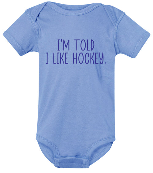 I'm told I like hockey onesie