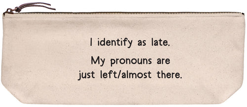 Pouch with text 'I identify as late. My pronouns are just left/almost there.' on a beige background