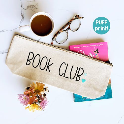 Cotton canvas zip pouch printed with "Book Club" in black text and two small hearts in teal and mint puff ink.