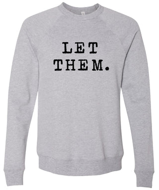 Light gray sweatshirt with 'Let them.' text printed in black ink.