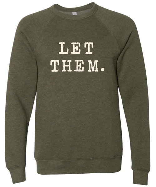Olive green sweatshirt with 'Let them.' text printed in cream ink.