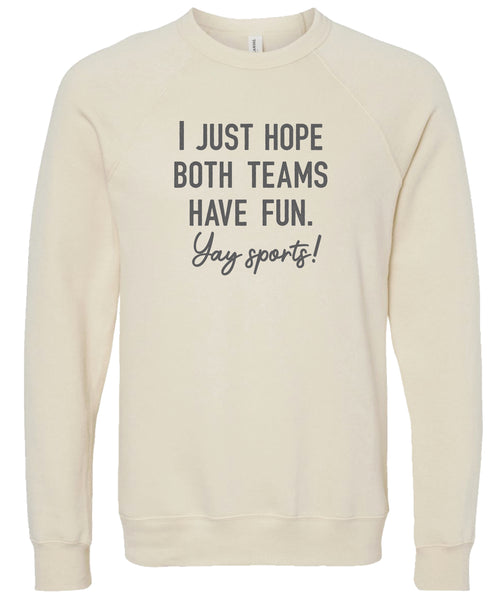 Cream sweatshirt with text 'I just hope both teams have fun. Yay sports!' printed in gray ink.