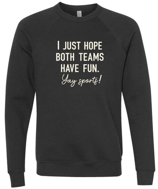 Black sweatshirt with text 'I just hope both teams have fun. Yay sports!' printed in cream ink.