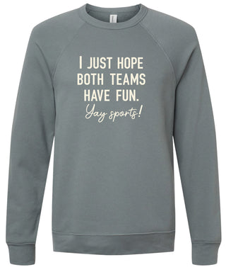 Storm colored sweatshirt with text 'I just hope both teams have fun. Yay sports!' printed in cream ink.