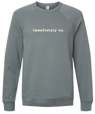Storm sweatshirt with 'immediately no.' text printed in cream ink.