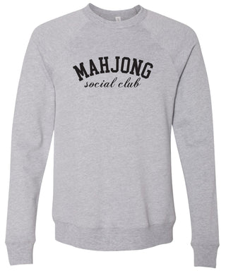 Gray sweatshirt with 'MAHJONG social club' text printed in black ink.