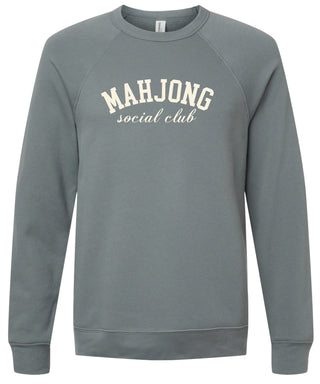 Storm sweatshirt with 'MAHJONG social club' text printed in cream ink.