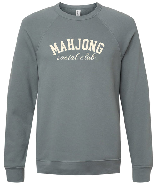 Storm sweatshirt with 'MAHJONG social club' text printed in cream ink.