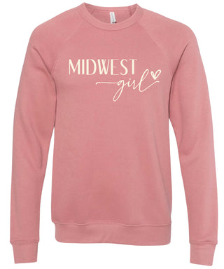 Pink sweatshirt with 'Midwest girl' text printed in cream ink.