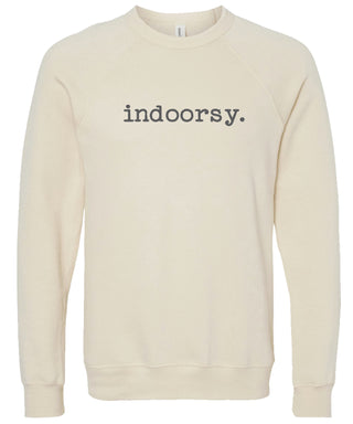 Cream sweatshirt with 'indoorsy.' text printed in gray ink.