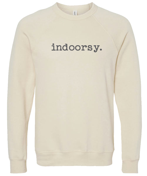 Cream sweatshirt with 'indoorsy.' text printed in gray ink.