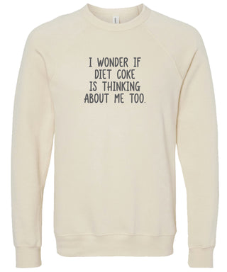 Cream sweatshirt with text 'I wonder if Diet Coke is thinking about me too' printed in gray ink.