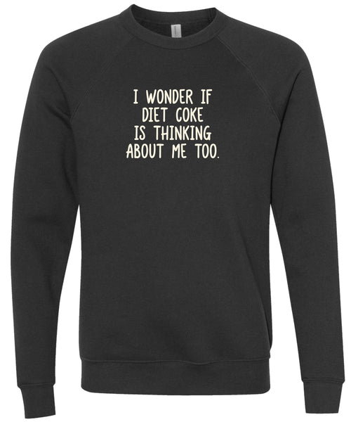 Black sweatshirt with text 'I wonder if Diet Coke is thinking about me too' printed in cream ink.