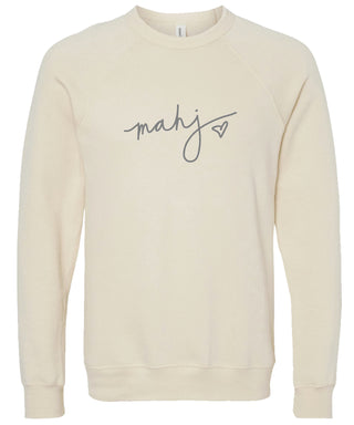 Cream sweatshirt with 'mahj' text with heart design in gray ink.