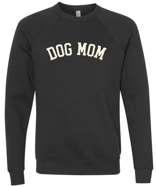 Black sweatshirt with 'DOG MOM' text printed in cream ink.