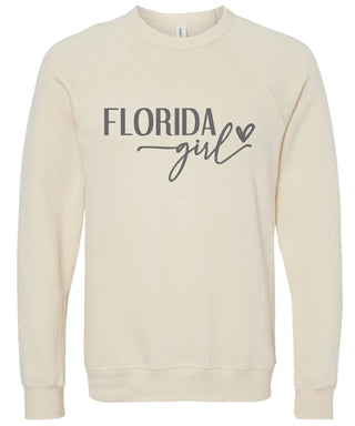 Cream sweatshirt with 'Florida girl' printed in gray ink.