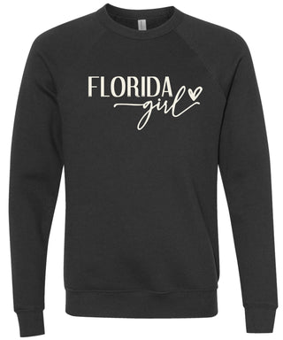 Black sweatshirt with 'Florida girl' printed in cream ink.