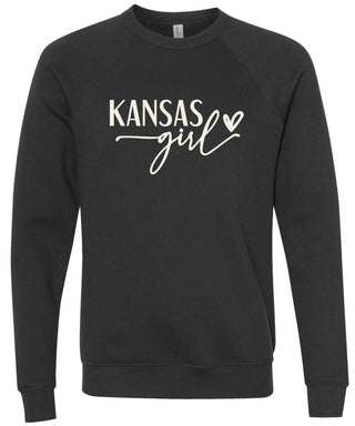 Black sweatshirt with 'Kansas girl' printed in cream ink.