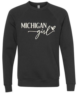 Black sweatshirt with 'Michigan girl' printed in cream ink.