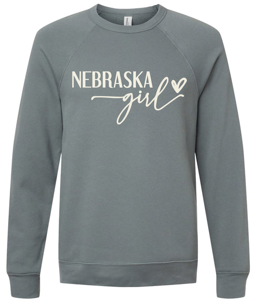Storm sweatshirt with 'Nebraska girl' printed in cream ink.