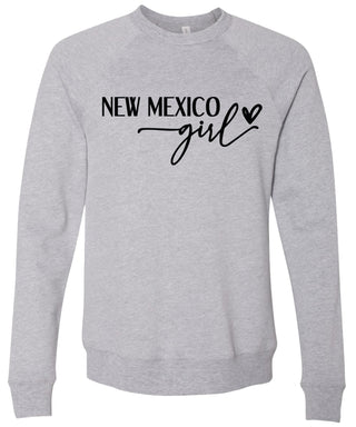 Heather gray sweatshirt with 'New Mexico girl' printed in black ink.