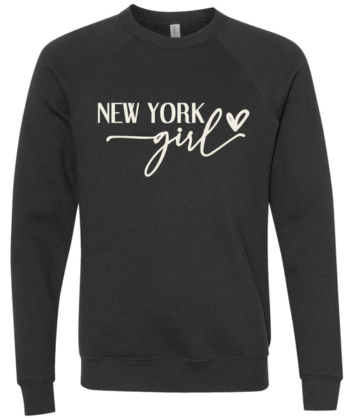 Black sweatshirt with 'New York girl' printed in cream ink.