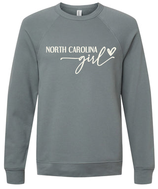 Storm sweatshirt with 'North Carolina girl' printed in cream ink.