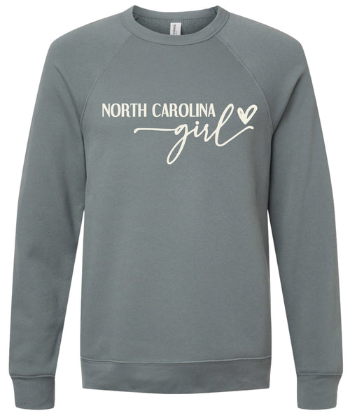 Storm sweatshirt with 'North Carolina girl' printed in cream ink.