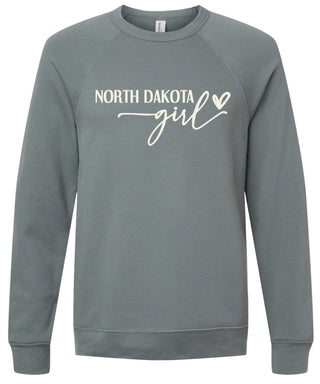 Storm sweatshirt with 'North Dakota girl' printed in cream ink.