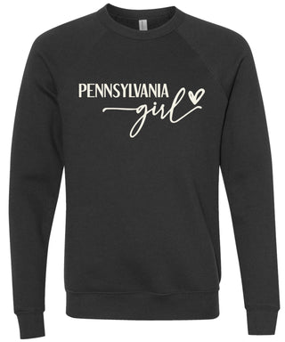 Heather black sweatshirt with 'PENNSYLVANIA girl' printed in cream ink.