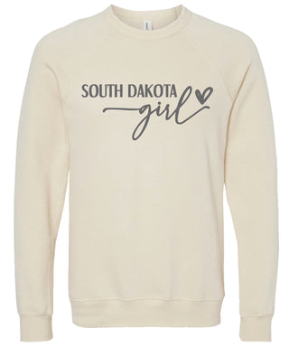 Cream sweatshirt with 'South Dakota girl' printed in gray ink.