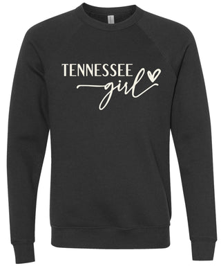 Black sweatshirt with 'Tennessee girl' printed in cream ink.