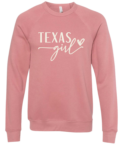 Dusty rose sweatshirt with 'Texas girl' printed in cream ink.