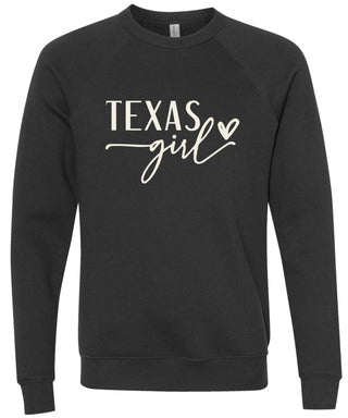 Black sweatshirt with 'Texas girl' printed in cream ink.