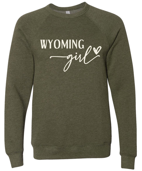 Heather olive sweatshirt with 'Wyoming girl' printed in cream ink.